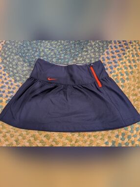 Nike Navy Golf Skort with Orange Swoosh and Zip